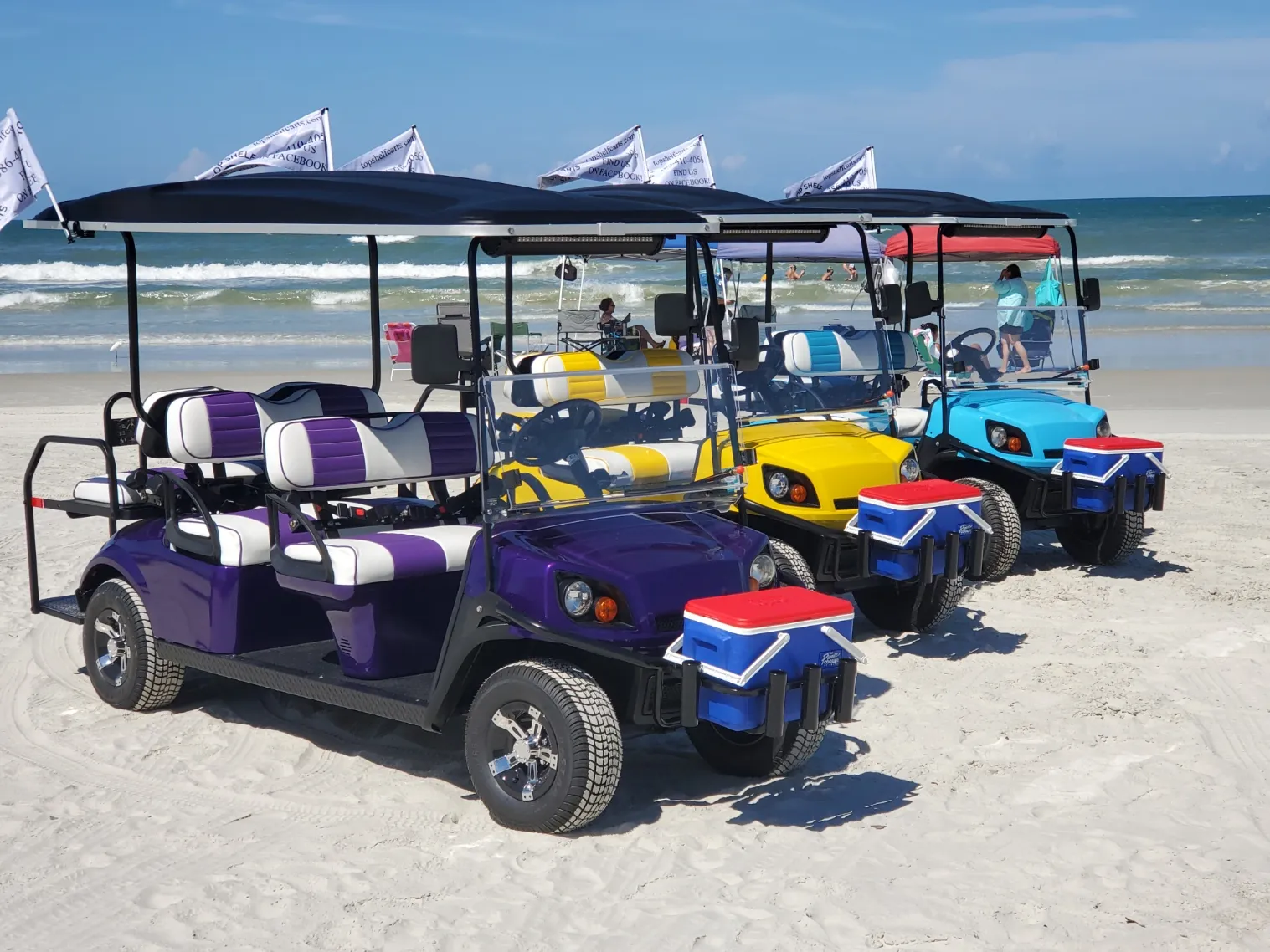 Colorful golf carts parked on New Smyrna Beach